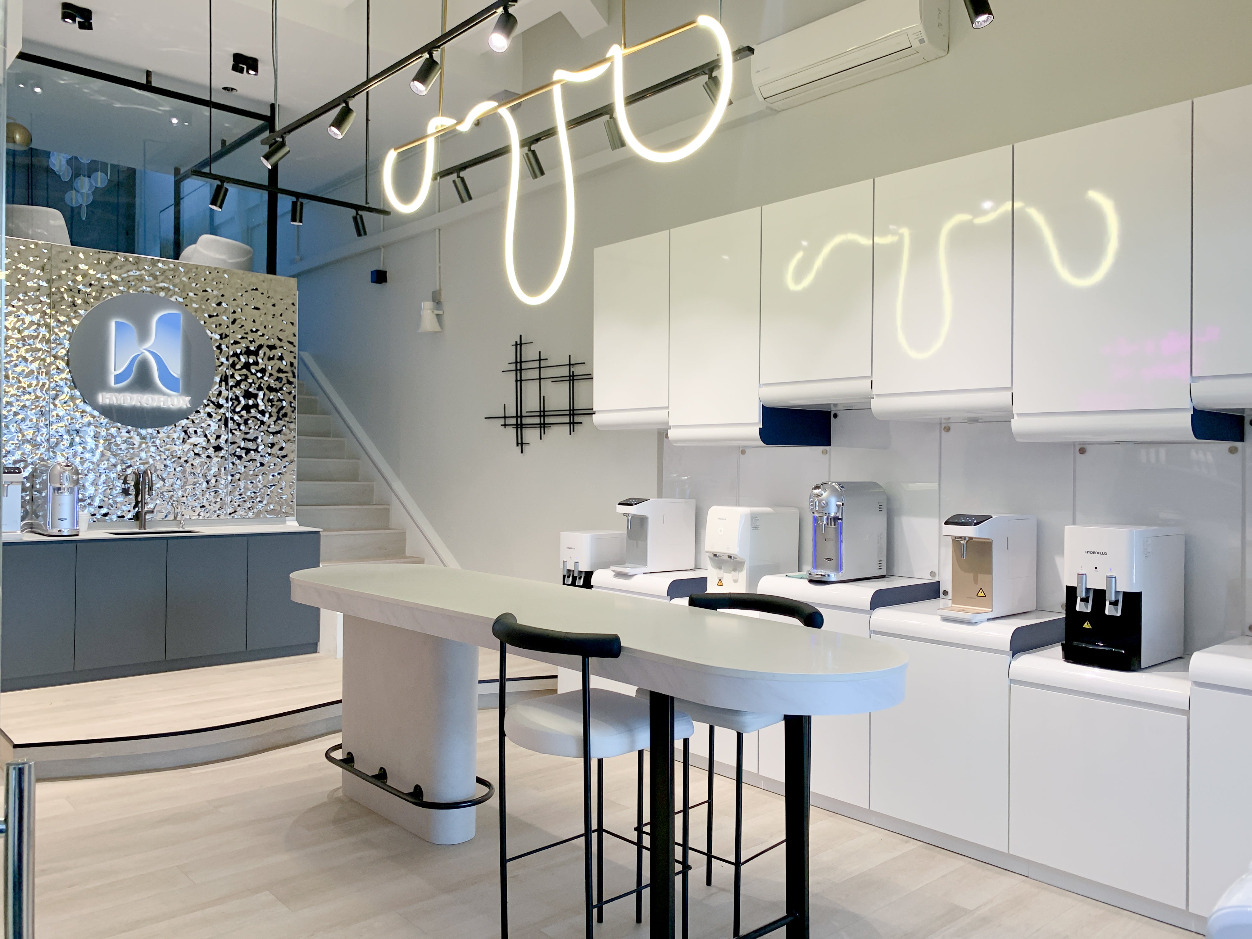 Hydroflux showroom interior with water dispensers on display