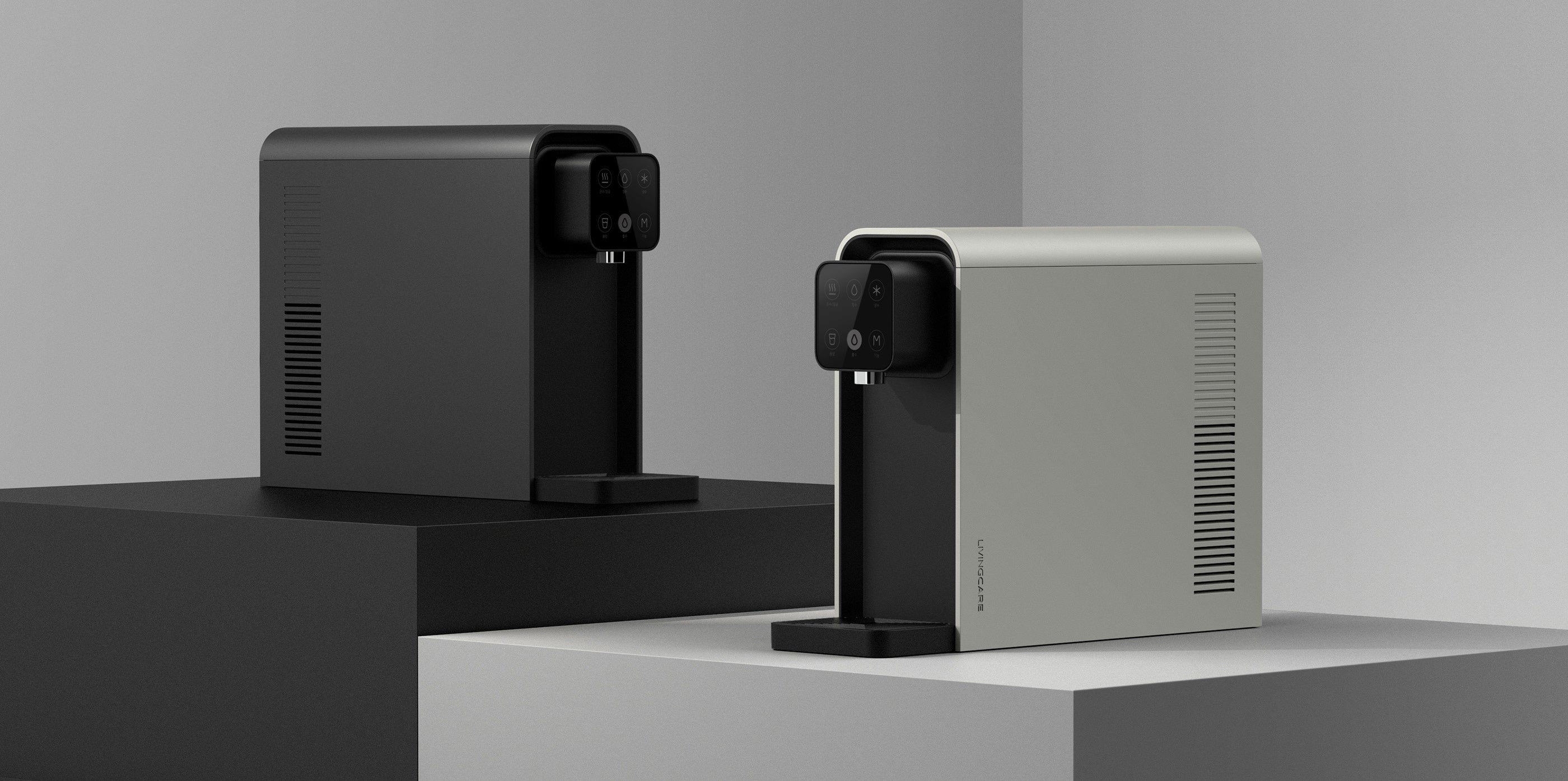 Livingcare black and sage water dispensers in a studio