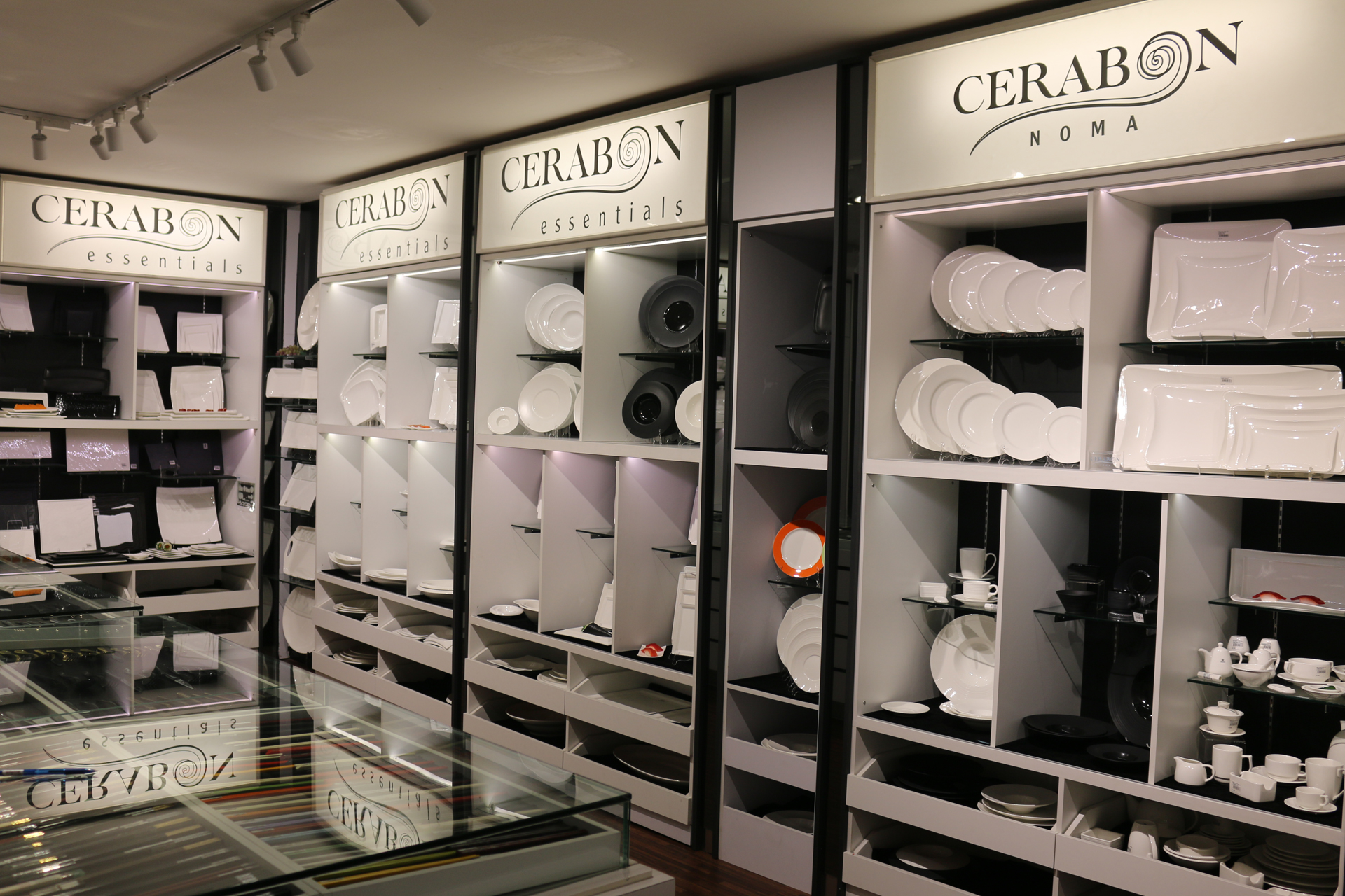 Sia Huat Cerabon showroom bays stacked with plates and teaware